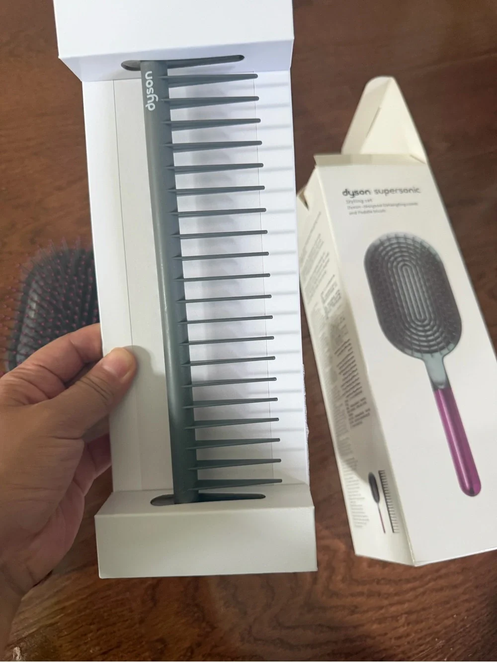 Dyson pink paddle brush with grey cushion